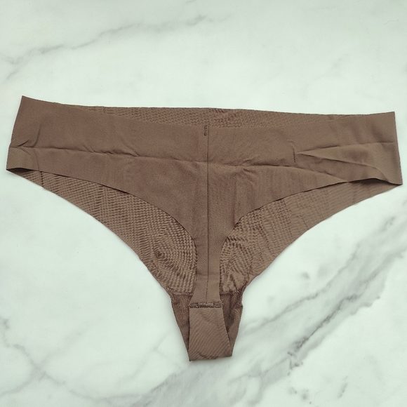 NWOT CALVIN KLEIN INVISIBLES THONG PANTY IN DARK BROWN SIZE LARGE - Picture 2 of 4